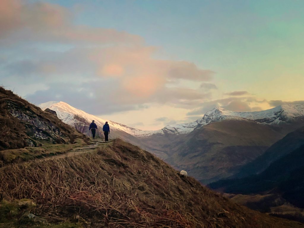 Couple hiking with mountain views