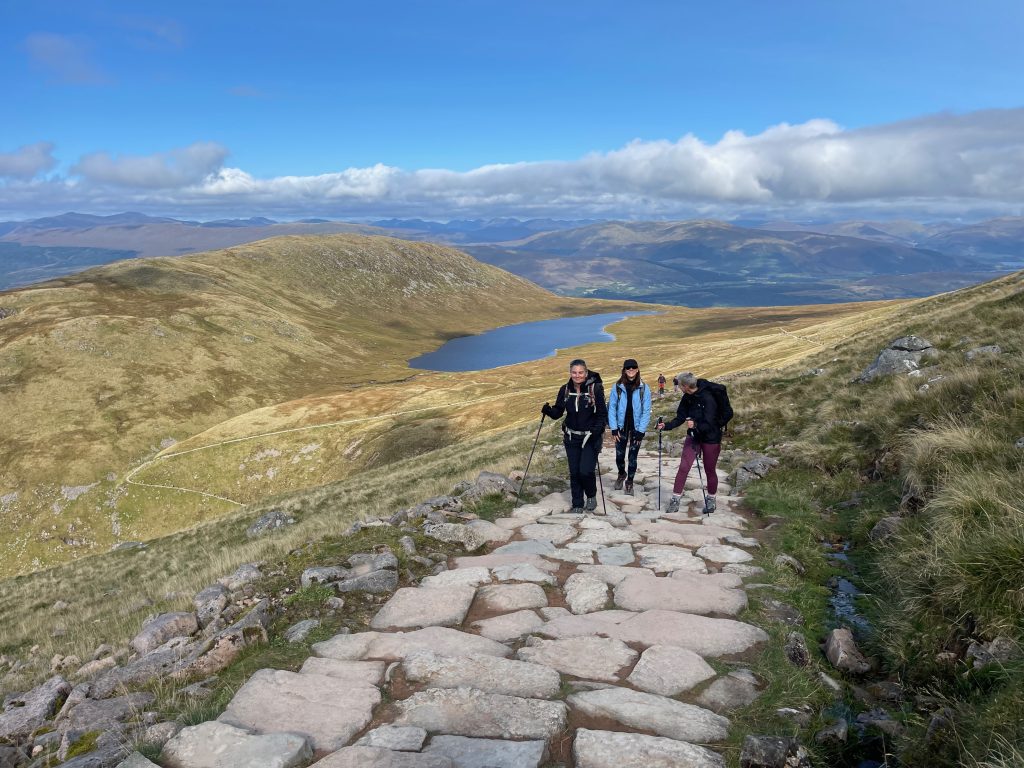 Group hiking near lake