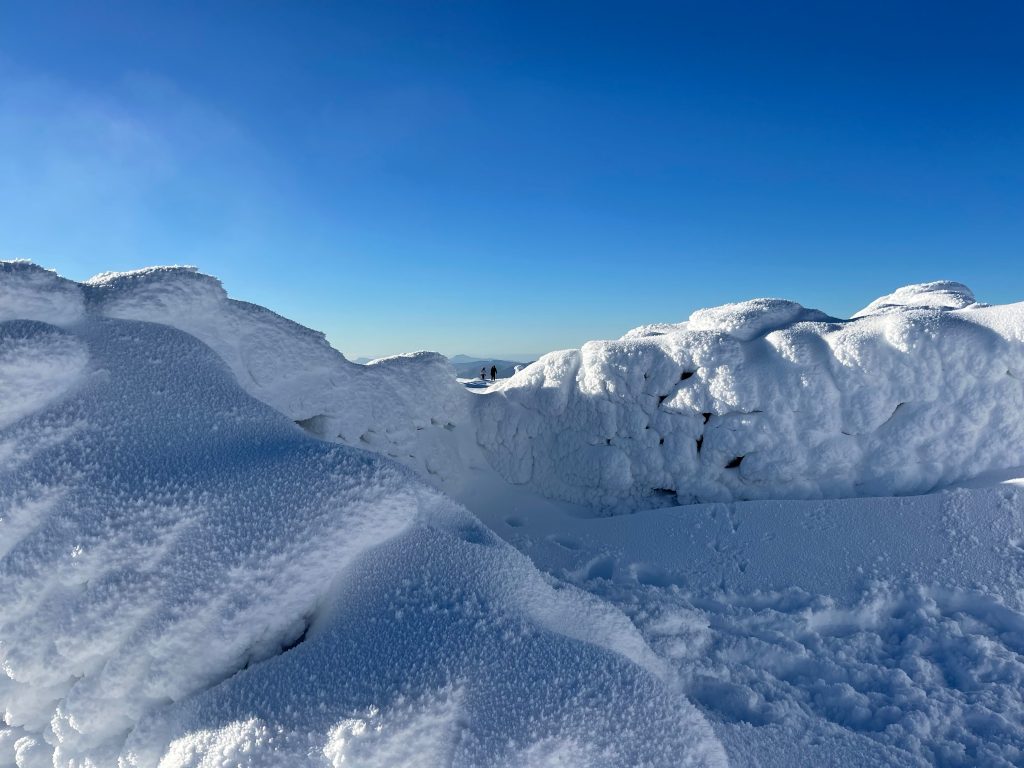 Snowy mountain with blue sky