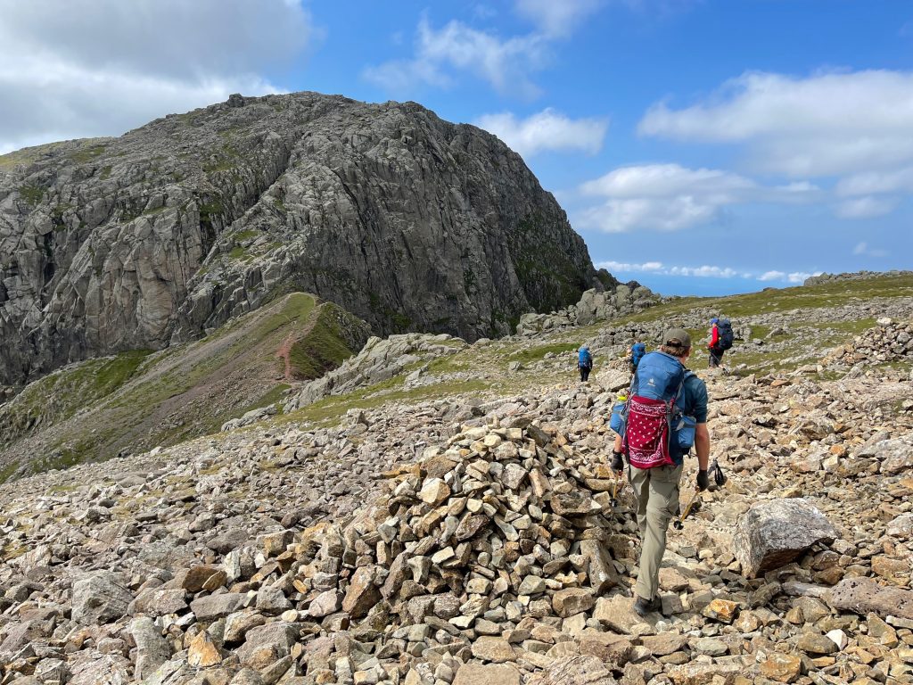 Group hiking on rocks